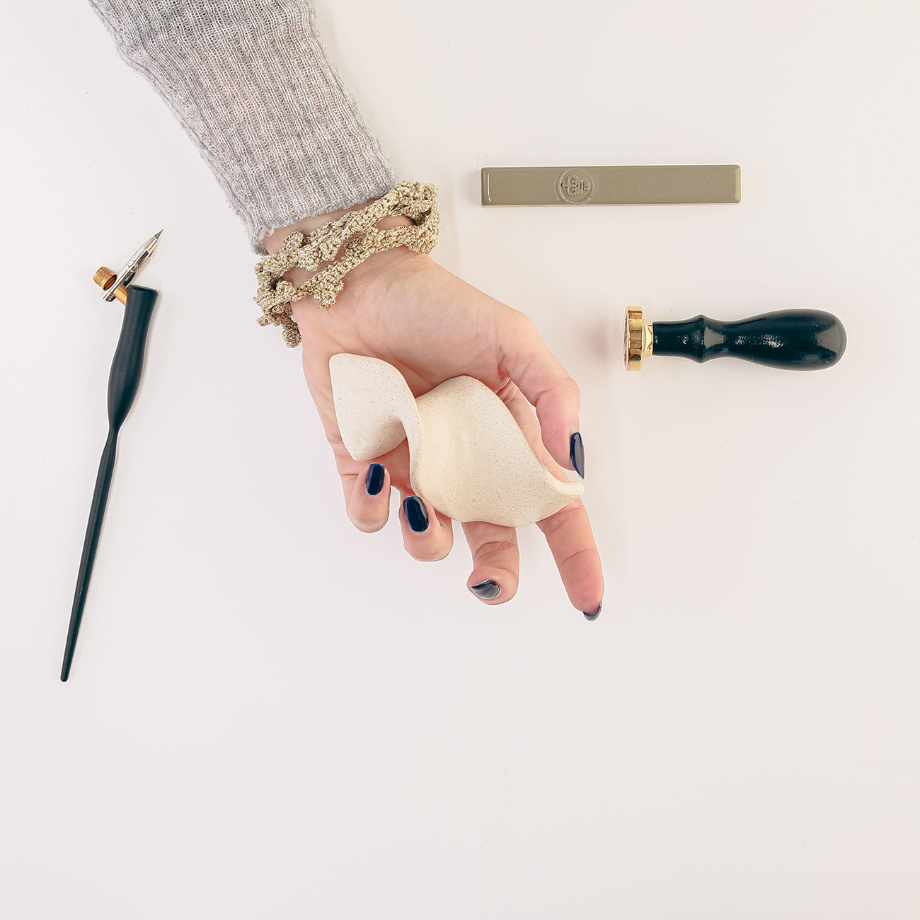 Ceramic pen rest "bone" shape