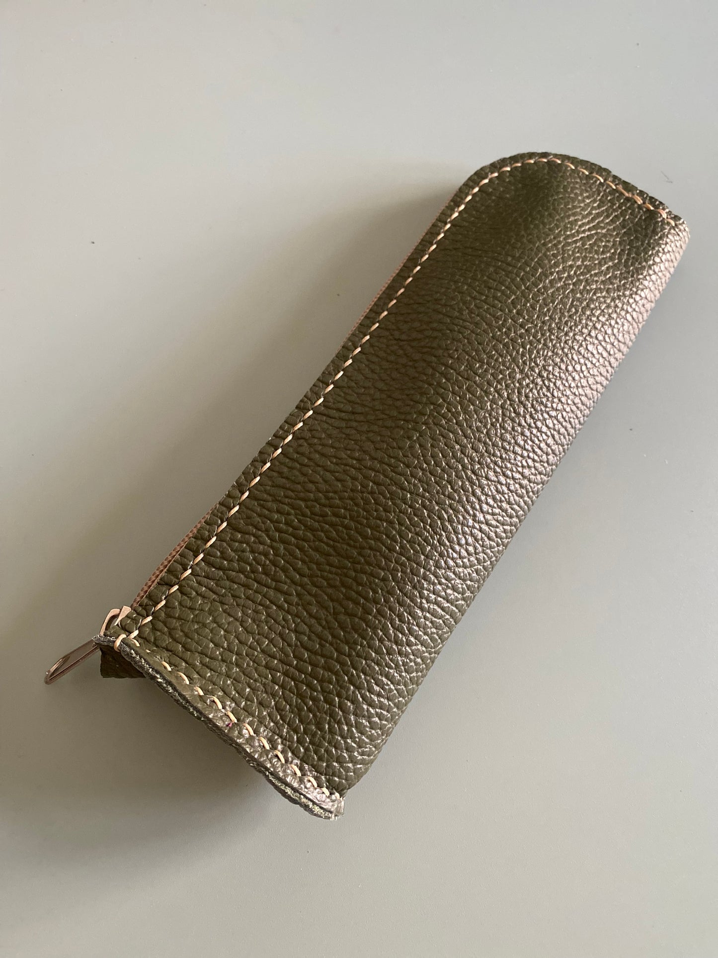 Pen case in olive leather
