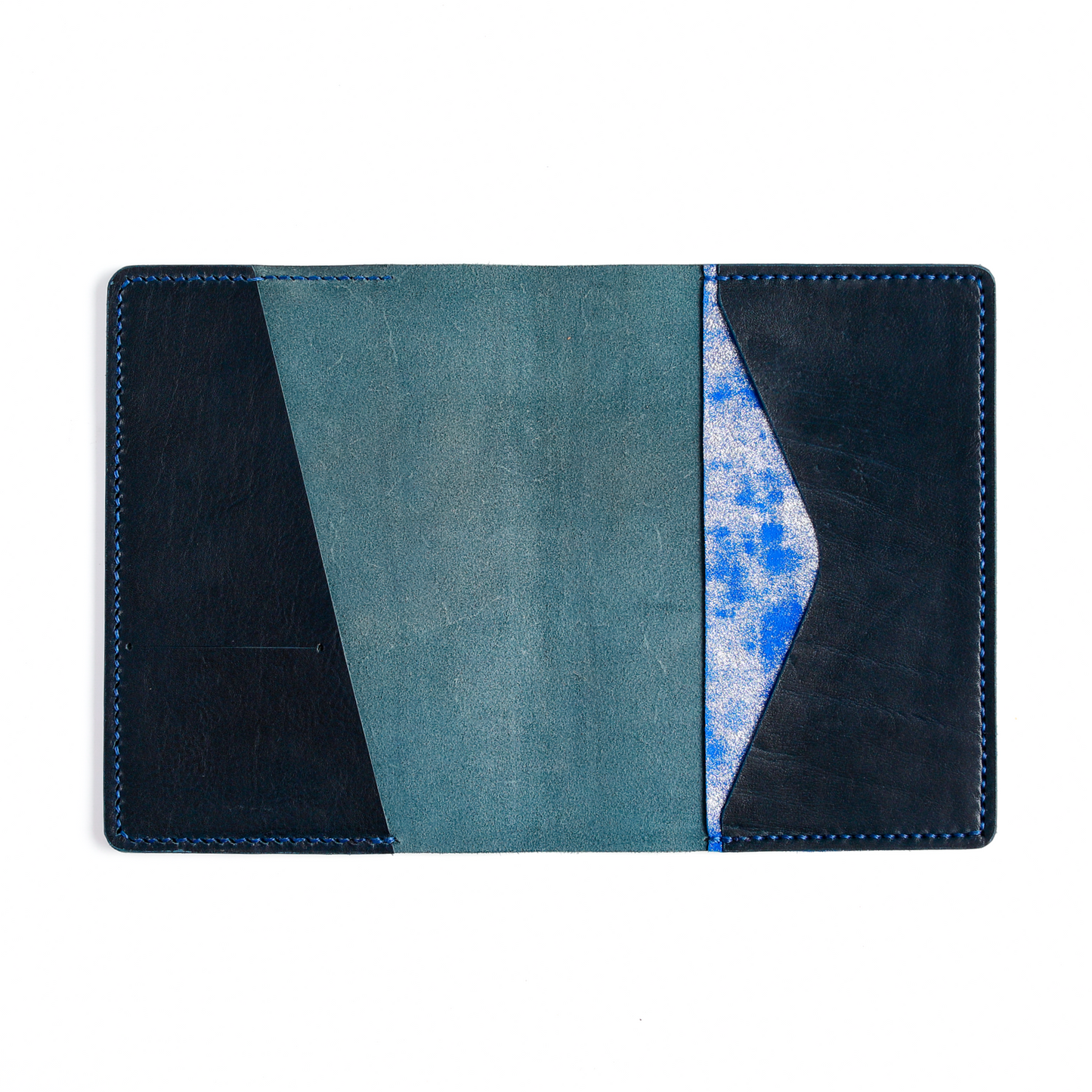 A5 cover in Storm leather with punch design open flat