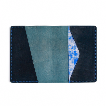 A5 cover in Storm leather with punch design open flat
