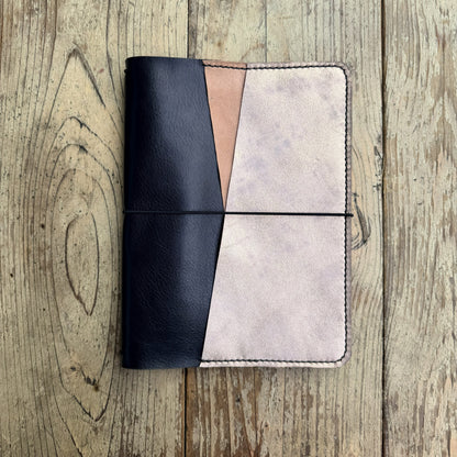 A5 size planner cover in Nero leather closed view