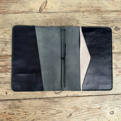 A5 size planner cover in Nero leather open flat