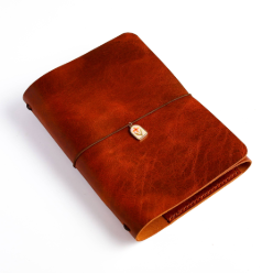 Front view of A5 Trifold leather cover in Cognac leather