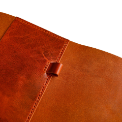 Pen loop detail on A5 Trifold Cognac leather cover