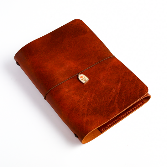 A5 trifold cover in Cognac leather angled view