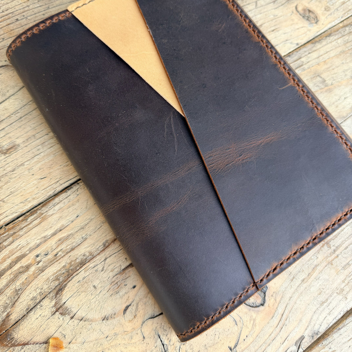 An A5 size trifold cover with outer pockets 