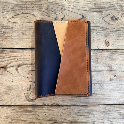 A5 trifold cover in espresso leather Petras design with undyed and cuero leatner for accent pockets.