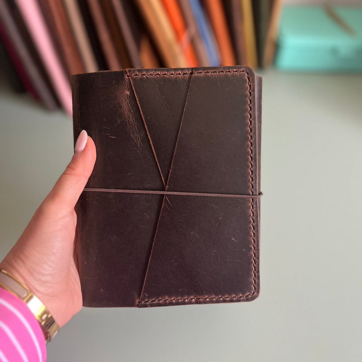 A6 Areti Trifold Reverse cover shown closed in Espresso leather