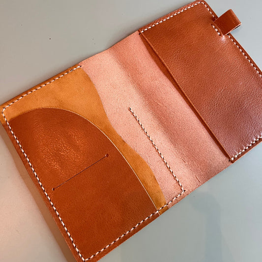 A6 leather planner cover in Antico leather open flat