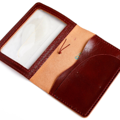 A6 Areti cover open flat showing transparent window pocket and interior pockets