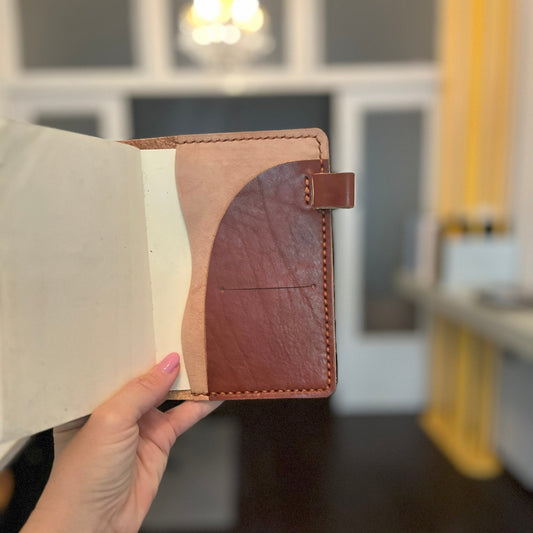 Open view of A6 Areti leather cover in Rame with nip closure