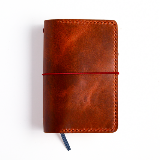 Pocket size in Cognac leather