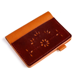 Angled view of Pocket leather cover with decorative flower design