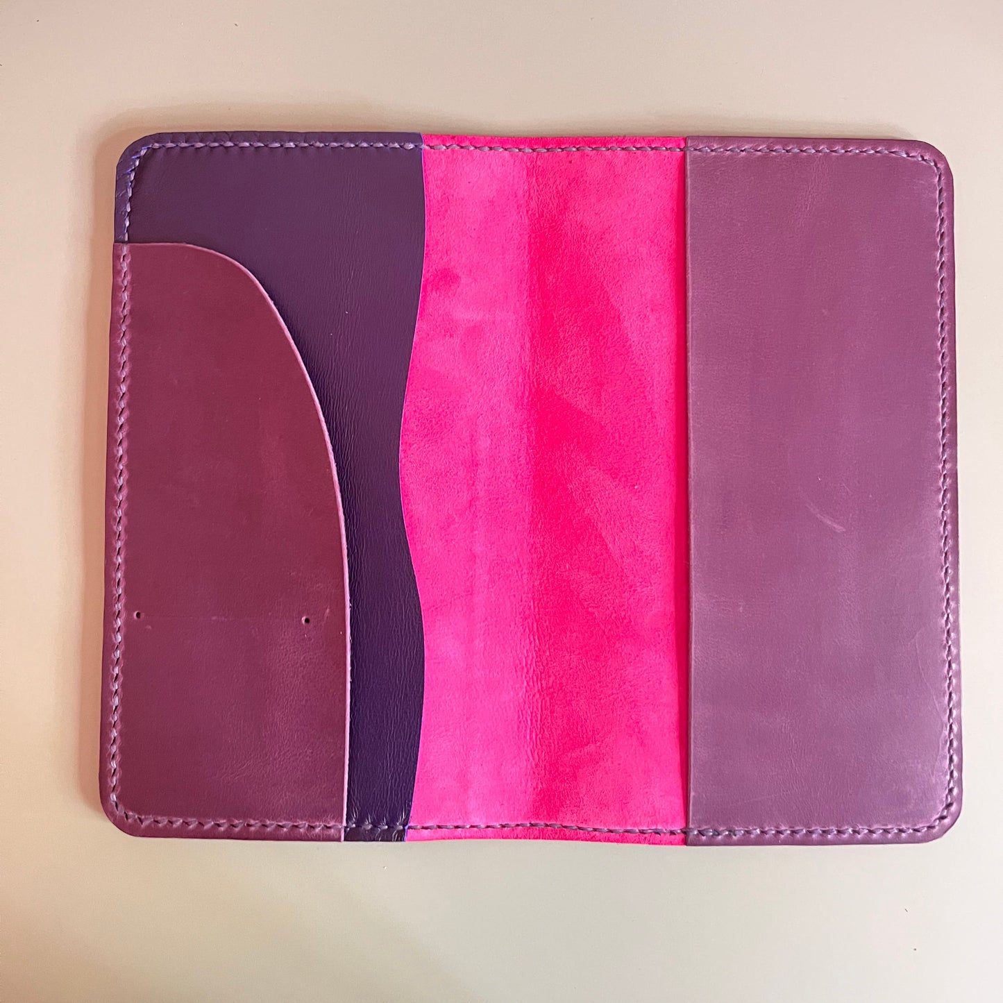 Open flat TN Aris leather cover in Deep Purple, Fuchsia and Blueberry