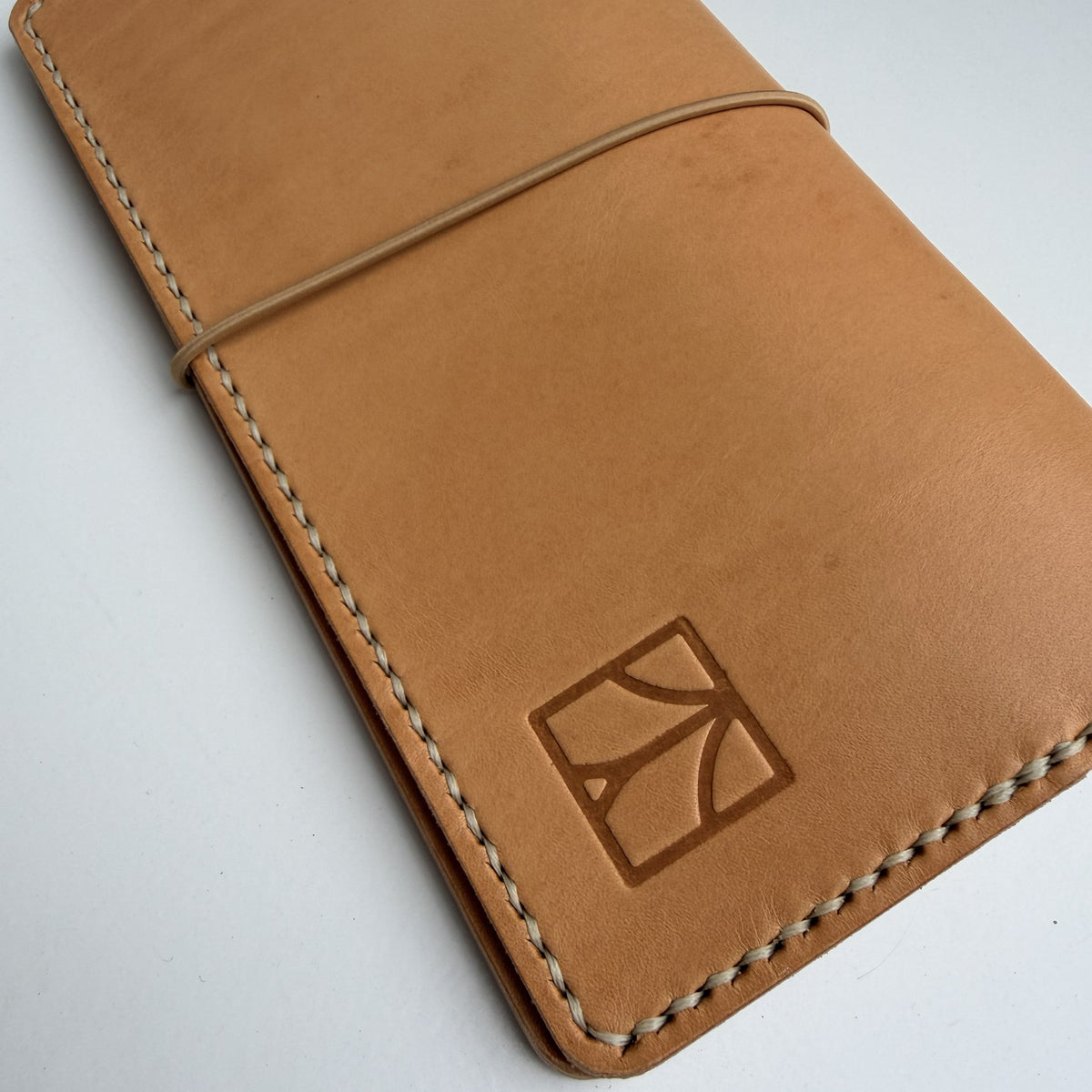 Travelers notebook in undyed leather back  side