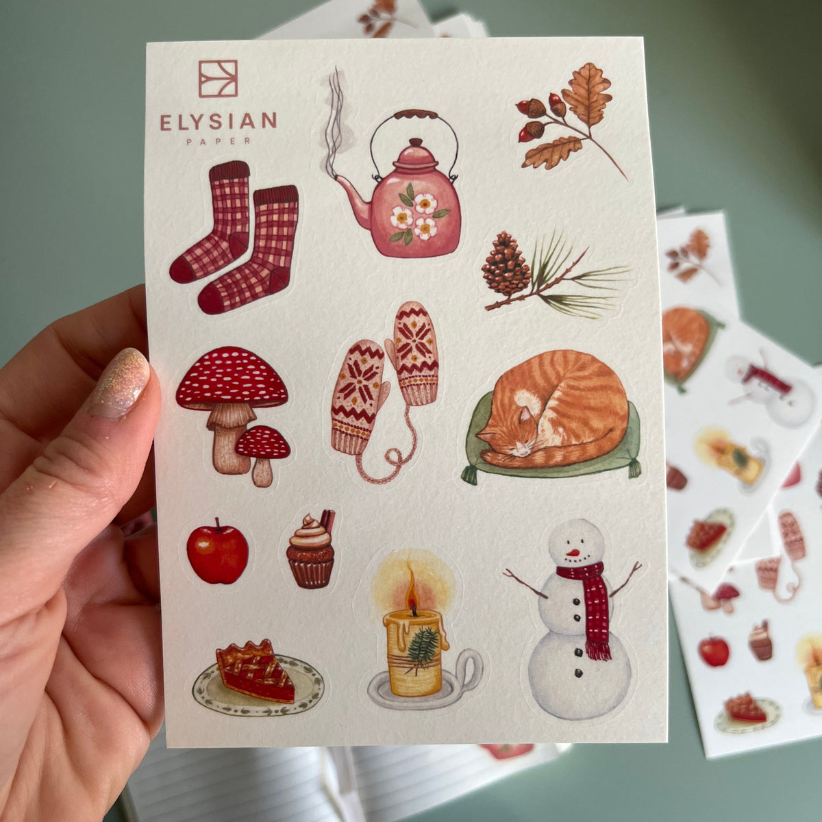 Winter-themed washi stickers featuring various designs including a tea set, a mushroom, a snowman, and other cold-weather related images.