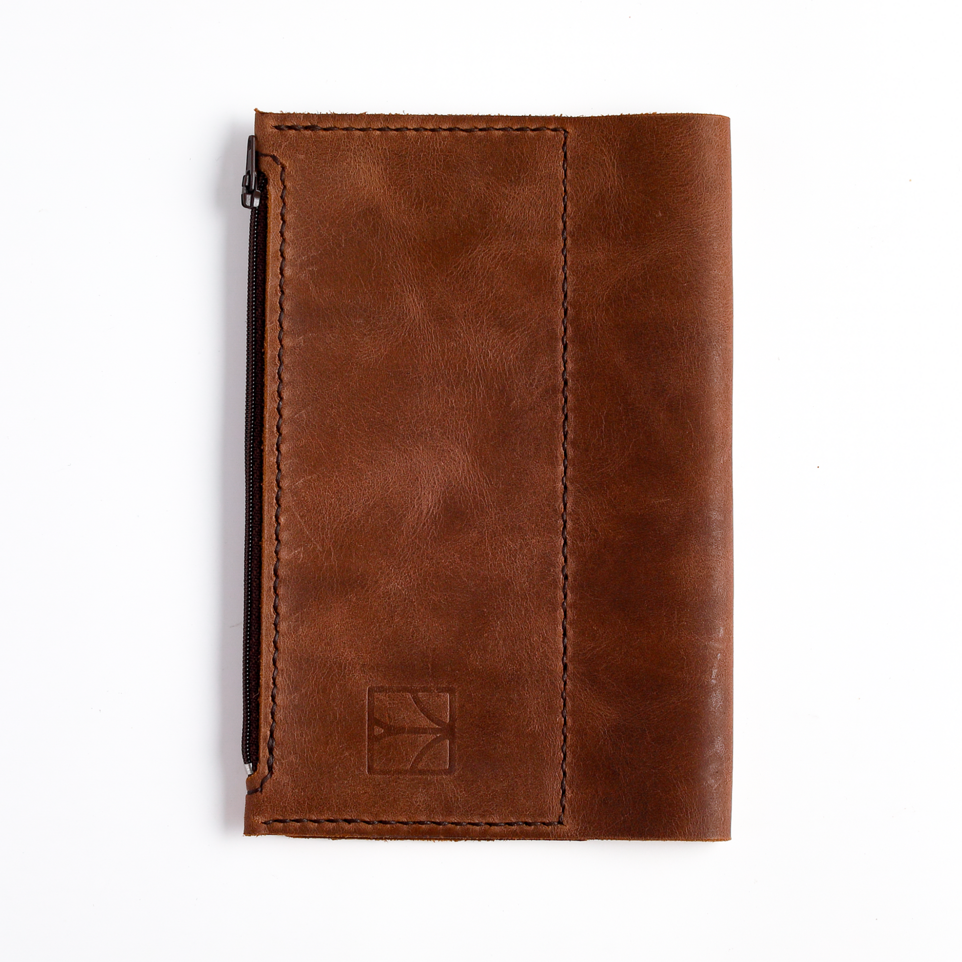 Closed leather insert wallet showing vegetable-tanned leather texture