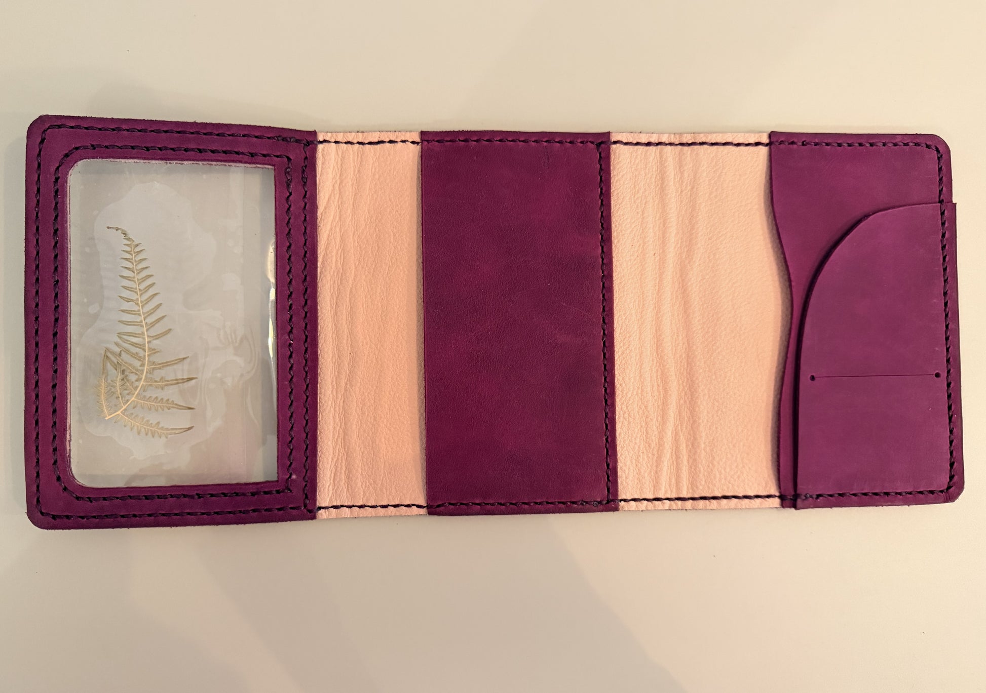 Open flat view of A6 Areti Trifold leather cover in Marsala