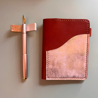 Passport cover in Ruggine leather with Salmon platina outer pocket closed view