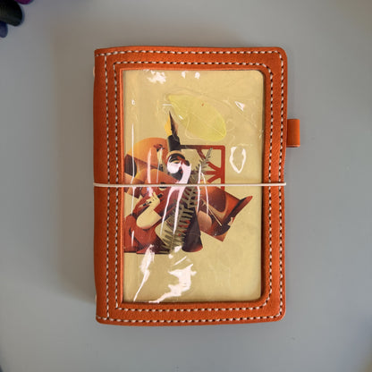 Ready to ship B6 Areti leather cover in Naranja leather with transparent window pocket