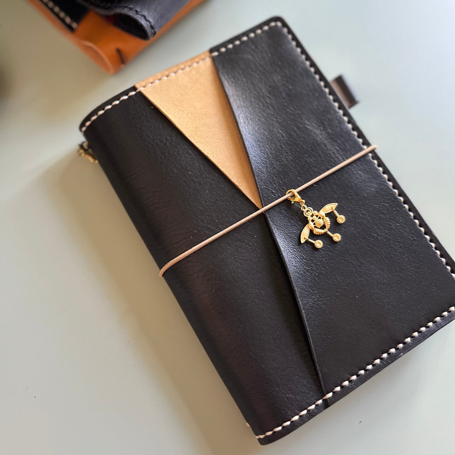 Ready to ship B6 Petras leather cover with diagonal pocket in Nero and Beige leather
