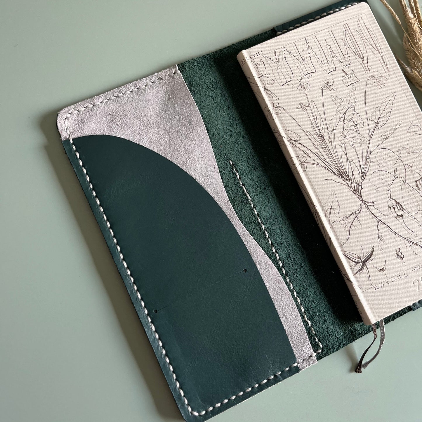 Open view of Weeks Aris leather planner cover with Ice Grey pocket