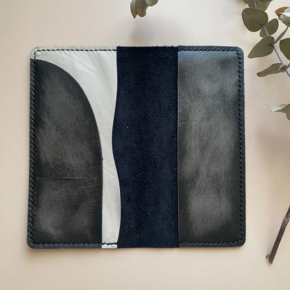 Open view of Weeks Armonia leather cover with Ice Grey detail